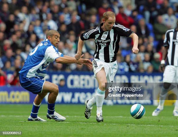 James Harper of Reading challenges with Nicky Butt of Newcastle during the Barclays Premier League match between Reading and Newcastle United at the...