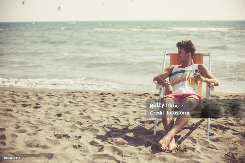 Man relaxing at the beach