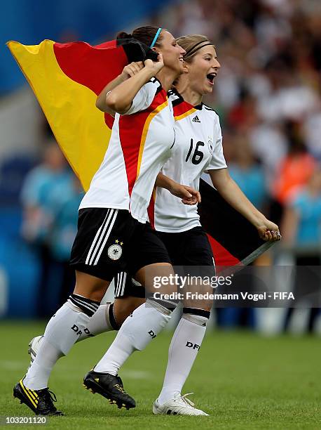 Jessica Wich and Marie-Louise Bagehorn of Germany celebrate after winning the FIFA U20 Women's World Cup Final match between Germany and Nigeria at...