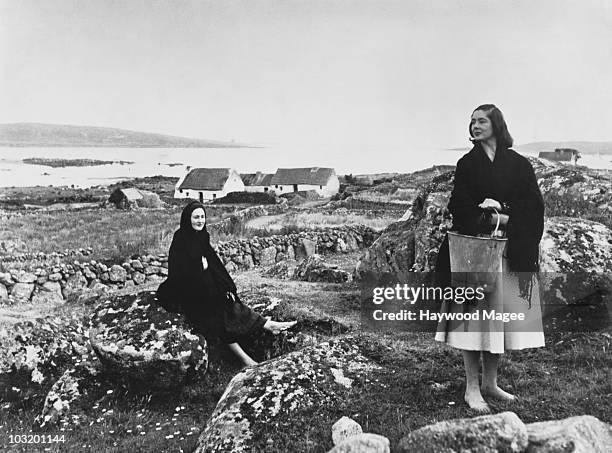 Two local women in Galway Bay, in the Republic of Ireland, 16th August 1955. Original Publication: Picture Post - 8923 - Many Faces Of Beauty - unpub.