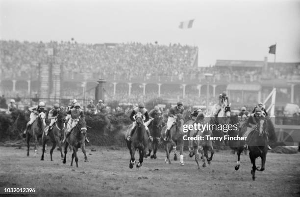 Jockeys in action at the Grand National horse race at Aintree Racecourse, Liverpool, UK, 30th March 1963.
