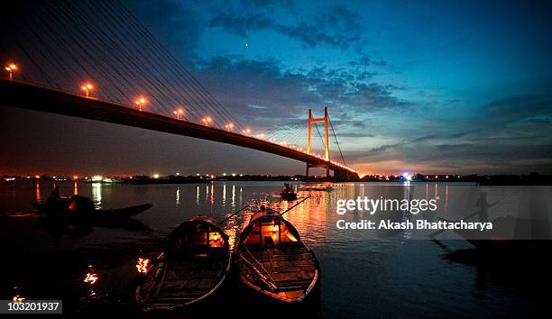 sunset at 2nd hoogly bridge - kolkata bridge stock pictures, royalty-free photos & images