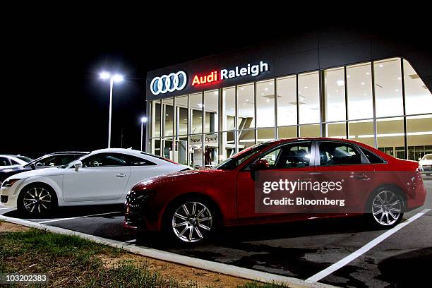 An Audi A4 sedan sits on display outside the Audi Raleigh dealership in Raleigh, North Carolina, U.S., on Saturday, July 31, 2010. U.S. Auto sales...