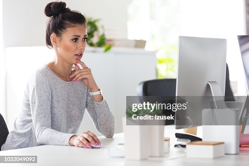 Computer Program Worried Female Computer Programmer Looking Worried While Working High-Res Stock ...