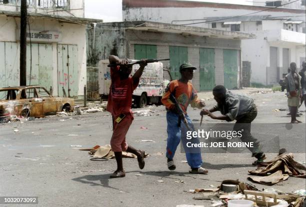 Guerrillas loyal to the National Patriotic Front of Liberia led by Charles Taylor and warlord Alhaji Kromah fire 18 May 1996 in Monrovia at a...
