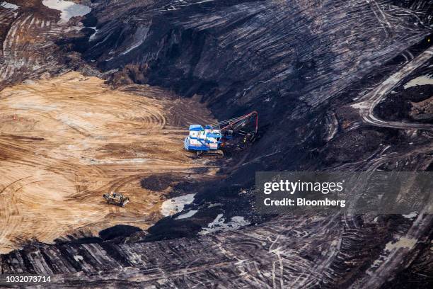 Dragline excavator is seen at the Suncor Energy Inc. Fort Hills mine in this aerial photograph taken above the Athabasca oil sands near Fort...