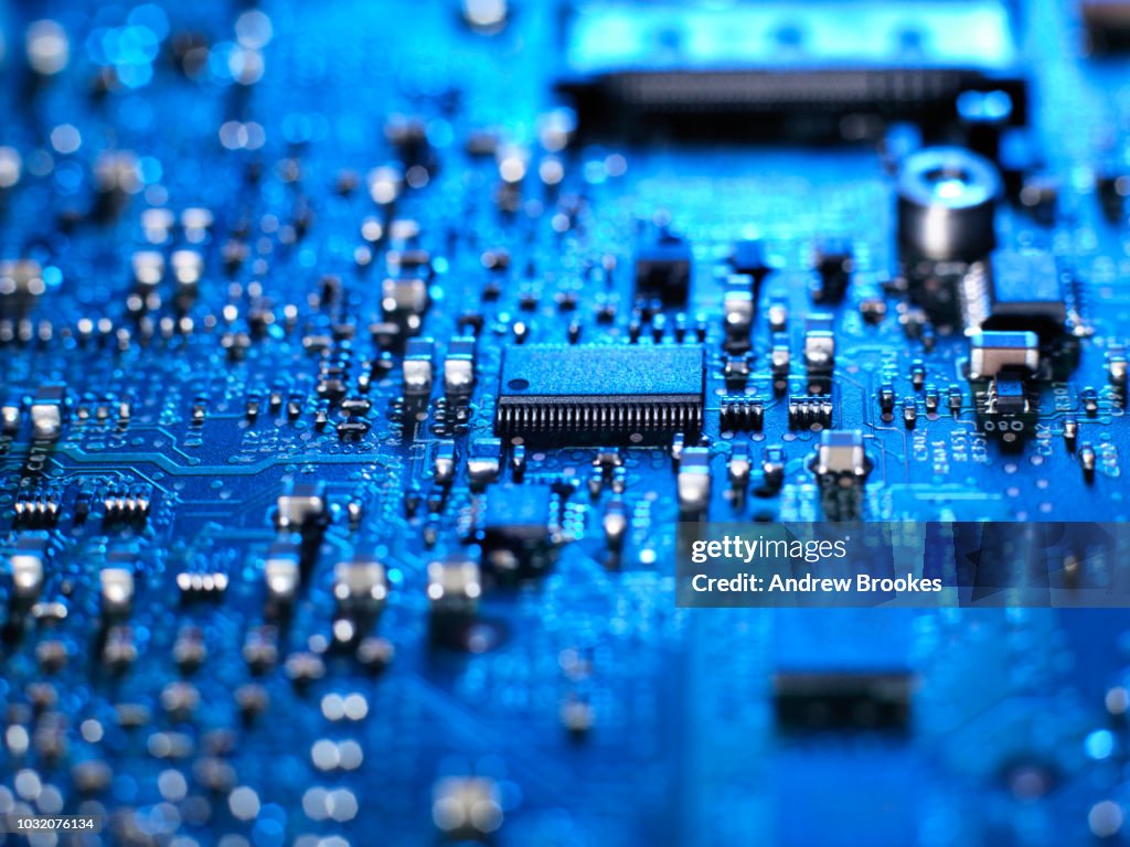 Inside of a laptop computer showing chips, circuit boards and components