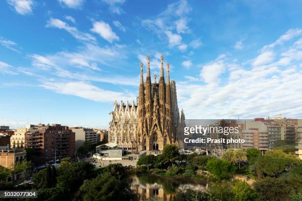 aerial view of the sagrada familia, a large roman catholic church in barcelona, spain, designed by catalan architect antoni gaudi. - barcelona spain stock pictures, royalty-free photos & images