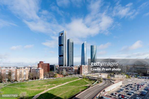 madrid cityscape at daytime. landscape of madrid business building at four tower. modern high building in business district area at spain. - madrid fotografías e imágenes de stock