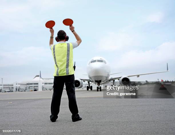 jumbo jet parking - aircraft landing stock pictures, royalty-free photos & images