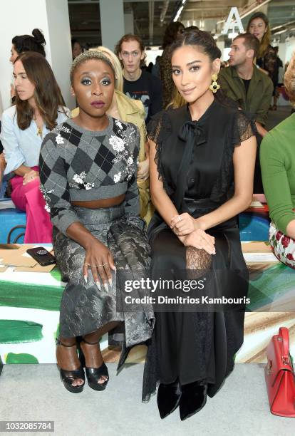Cynthia Erivo and Shay Mitchell attend the Michael Kors Collection Spring 2019 Runway Show at Pier 17 on September 12, 2018 in New York City.