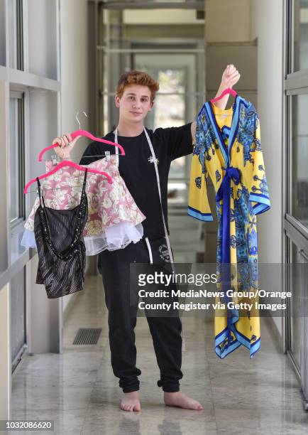Dillon Eisman shows off used clothing he's upcycled for his project, Sew Sag, Inc. At his home in Malibu, CA, on Thursday, June 28, 2018. Eisman is...