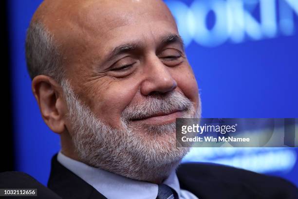 Former Federal Reserve Board Chairman Ben Bernanke attends a conference with former U.S. Treasury Secretary Timothy Geithner and former U.S. Treasury...