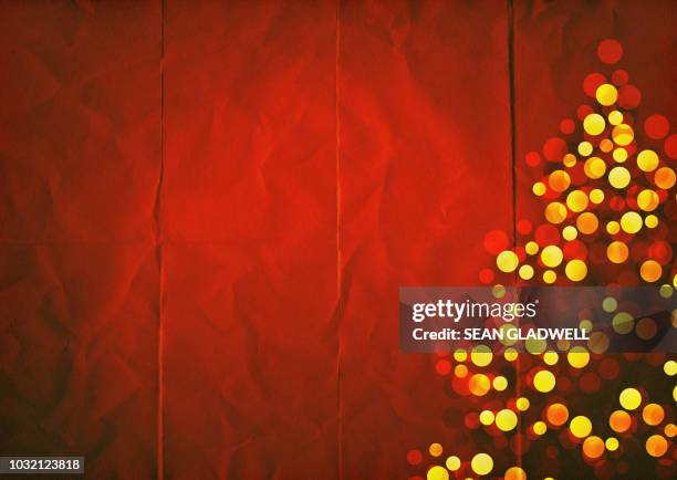 red paper christmas tree illustration - red abstract christmas tree stock pictures, royalty-free photos & images