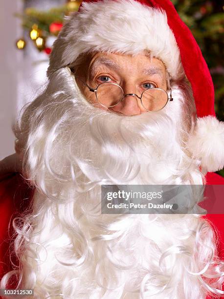 senior father christmas with long beard - santa hat and beard stock pictures, royalty-free photos & images