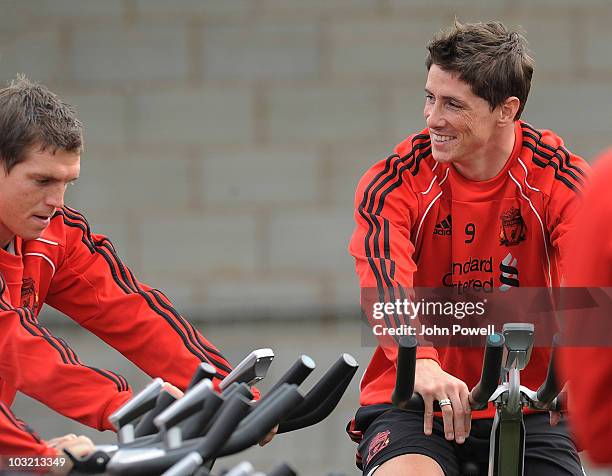 Fernando Torres and Daniel Agger of Liverpool during a training session at Melwood training ground on August 3, 2010 in Liverpool, England.