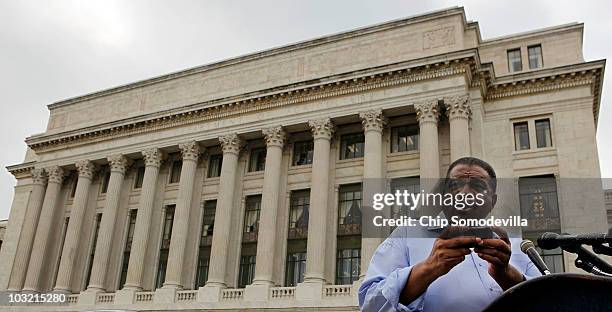 Black Farmers and Agriculturalists Association President Tom Burrell holds a news conference in front of the U.S. Department of Agriculture, where he...
