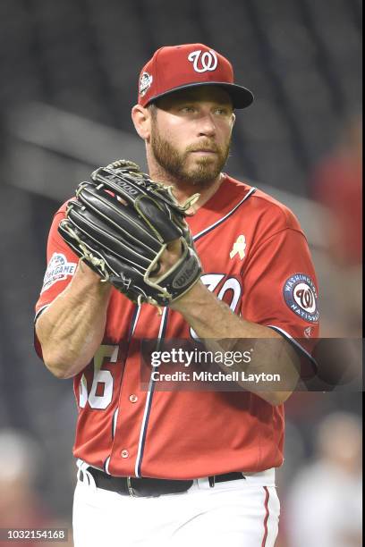 Greg Holland of the Washington Nationals walks back to the dug out during a baseball game against the Milwaukee Brewers at Nationals Park on...