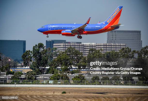 Southwest jet lands on runway 20R at John Wayne Airport in Santa Ana, California, on Wednesday, September 6, 2017.