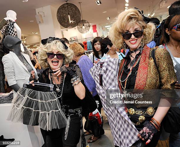 Elaine Chez and Camille Terry with pieces from the �Material Girl� clothing line by Madonna at the Material Girl clothing line launch at Macy's...