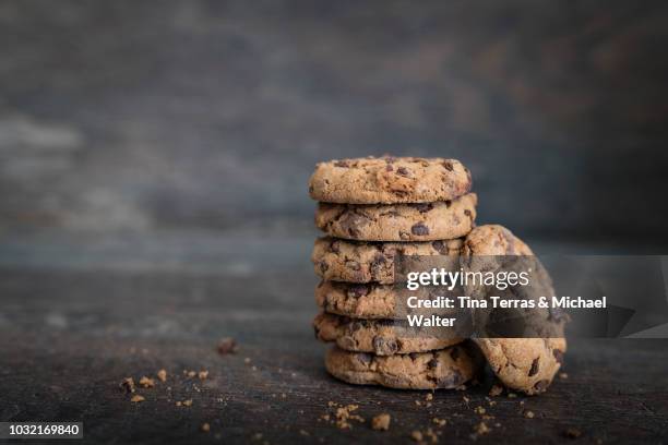 chocolate cookies on rustic wooden background. - cookies stock pictures, royalty-free photos & images