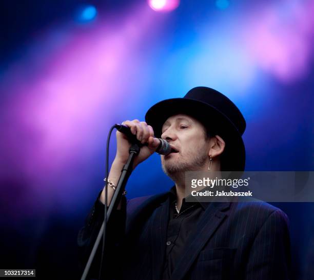 Singer Shane MacGowan of the English/ Irish Folk band The Pogues performs live during a concert at the Zitadelle on August 3, 2010 in Berlin, Germany.