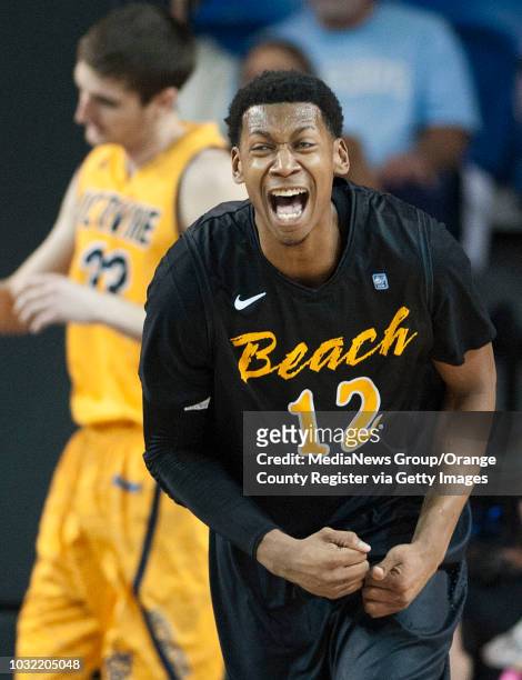 Long Beach State's Eric McKnight celebrates after hitting a shot against UC Irvine during the first half of their basketball game at the Bren Events...