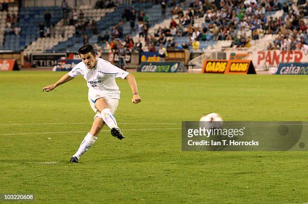 Joey Barton kicks the ball to score the winning penalty during a pre-season friendly match between Deportivo La Coruna and Newcastle United at The...