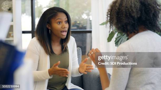 teenage girl with attitude argues with mom - teenager arguing stock pictures, royalty-free photos & images