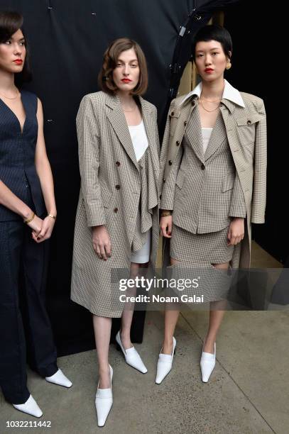 Models pose backstage for Calvin Luo during New York Fashion Week: The Shows at Gallery I at Spring Studios on September 12, 2018 in New York City.