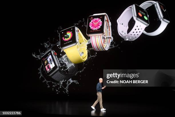 Apple CEO Tim Cook speaks during an Apple event on September 12 in Cupertino, California. - New iPhones set to be unveiled Wednesday offer Apple a...