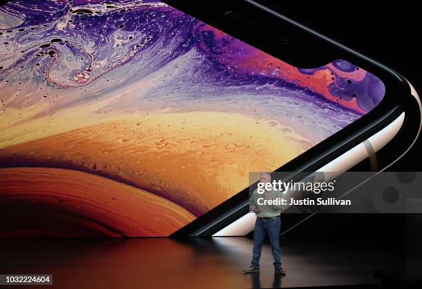 Phil Schiller, senior vice president of worldwide marketing at Apple Inc., speaks at an Apple event at the Steve Jobs Theater at Apple Park on...