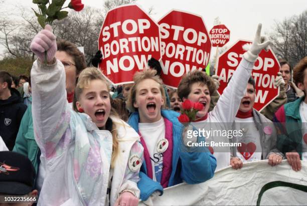 Participants in the anti-abortion rally "March for Life" let their views be known making their way to the Supreme Court.