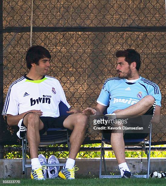 Forward Kaka and goalkeeper Iker Casillas of Real Madrid talk with each other during a training session on the campus of UCLA on August 3, 2010 in...