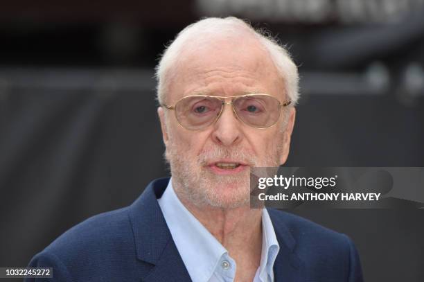 British actor Michael Caine poses on the red carpet for the world premiere of King of Thieves in central London on September 12, 2018.