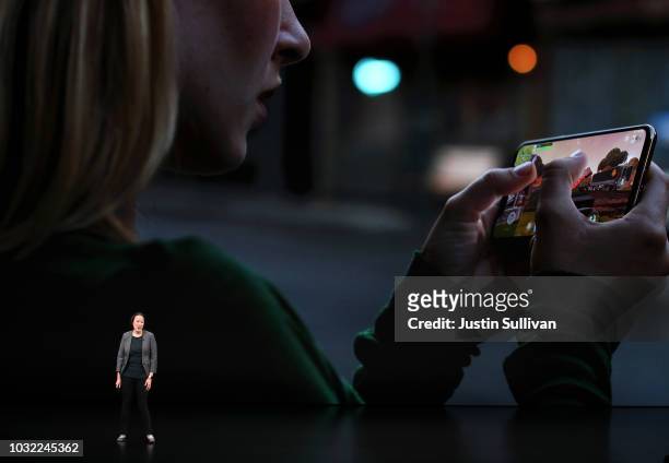 Kaiann Drance, Apple’s senior director, iPhone Worldwide Product Marketing speaks at an Apple event at the Steve Jobs Theater at Apple Park on...
