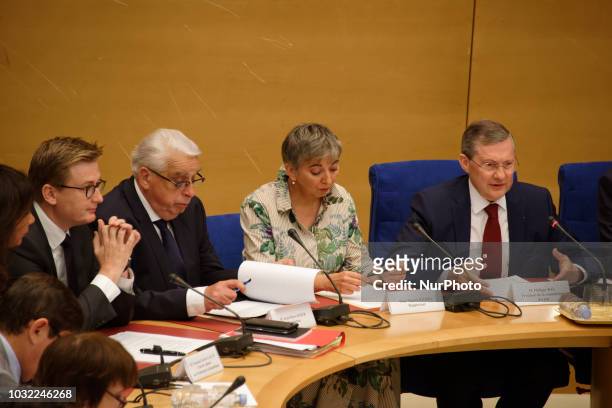 Francois-Xavier Lauch, chief of staff of the cabinet of the French president, flanked by Senate Law Commission rapporteurs French Senator of the...