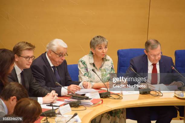 Francois-Xavier Lauch, chief of staff of the cabinet of the French president, flanked by Senate Law Commission rapporteurs French Senator of the...