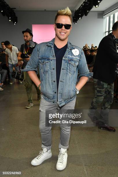 Photographer Werner Andrew attends the Marcel Ostertag front Row during New York Fashion Week: The Shows at Gallery II at Spring Studios on September...