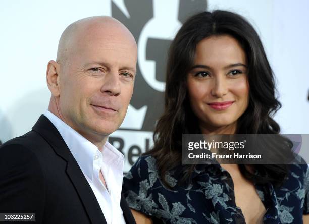Actor Bruce Willis and Emma Heming arrives at the Premiere Of Lionsgate Films' "The Expendables" at the Grauman's Chinese Theatre on August 3, 2010...