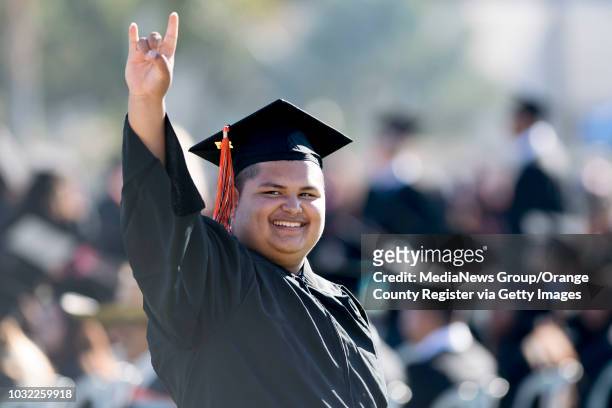 Juan Mayorquin celebrates during the Los Amigos High School Graduation at Bolsa Grande Stadium in Garden Grove, CA on Tuesday, June 20, 2017.