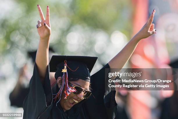 Graduate celebrates during the Los Amigos High School Graduation at Bolsa Grande Stadium in Garden Grove, CA on Tuesday, June 20, 2017.