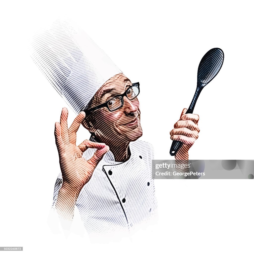 Smiling male chef making OK hand sign
