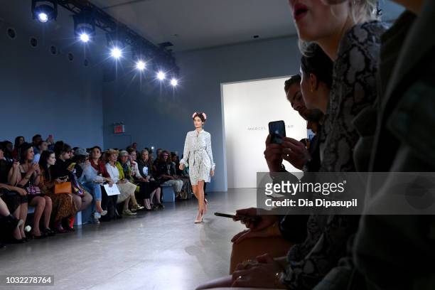 Model walks the runway during the Marcel Ostertag front Row during New York Fashion Week: The Shows at Gallery II at Spring Studios on September 12,...