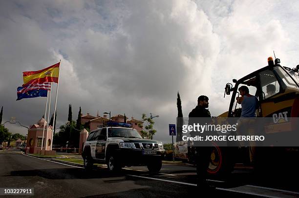 Spanish Civil Guards control the entrance of the hotel Villa Padierna, where US First Lady Michelle Obama arrived for her vacation in Spain, on...