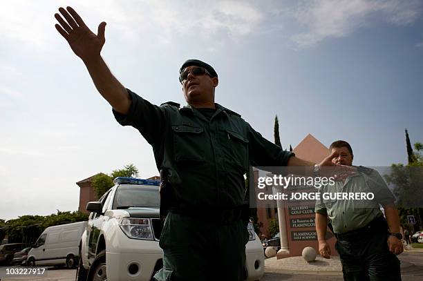 Spanish Civil Guards control the entrance of the hotel Villa Padierna, where US First Lady Michelle Obama arrived for her vacation in Spain, on...