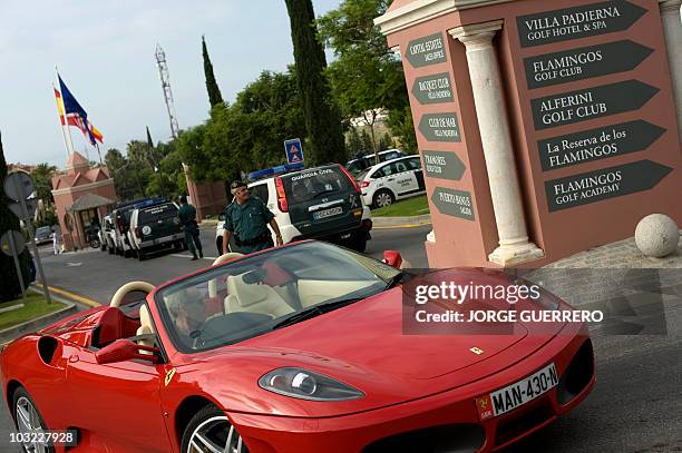 Spanish Civil Guards control the entrance of the hotel Villa Padierna, where US First Lady Michelle Obama arrived for her vacation in Spain, on...