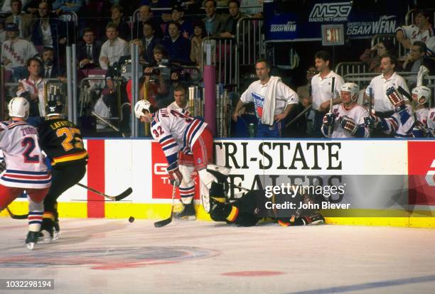 New York Rangers Stephane Matteau in action vs Vancouver Canucks Shawn Antoski at Madison Square Garden. Game 1. New York, NY 5/31/1994 CREDIT: John...