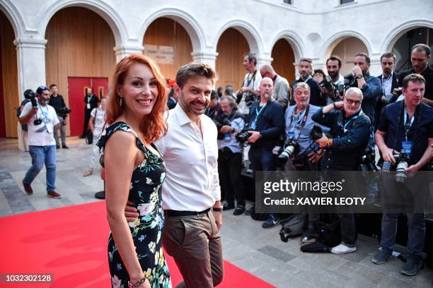 French actors Julia Dorval and Aliocha Itovich pose for photographers during the 20th edition of the "Festival de fiction TV" in La Rochelle, western...
