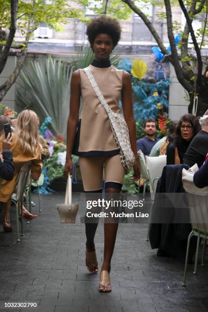 Model walks for the Staud Presentation during New York Fashion Week: The Shows at Laudree on September 12, 2018 in New York City.